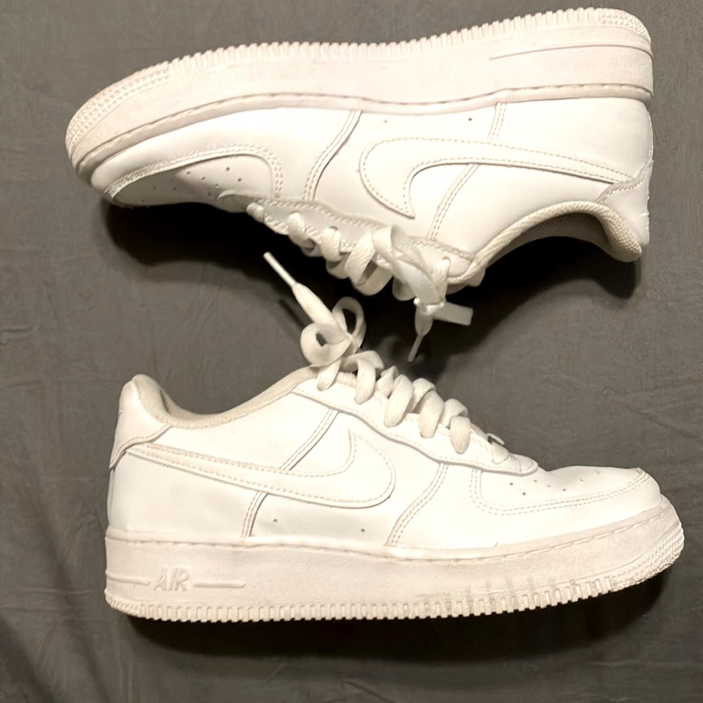 All white Nike Air Force ones